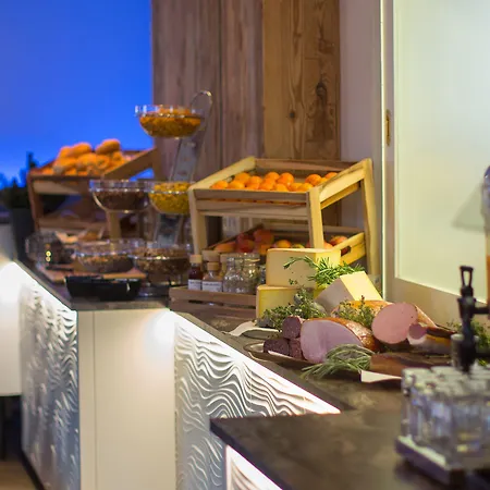 Hotel Heitzmann - Hotel&rooftop Zell am See